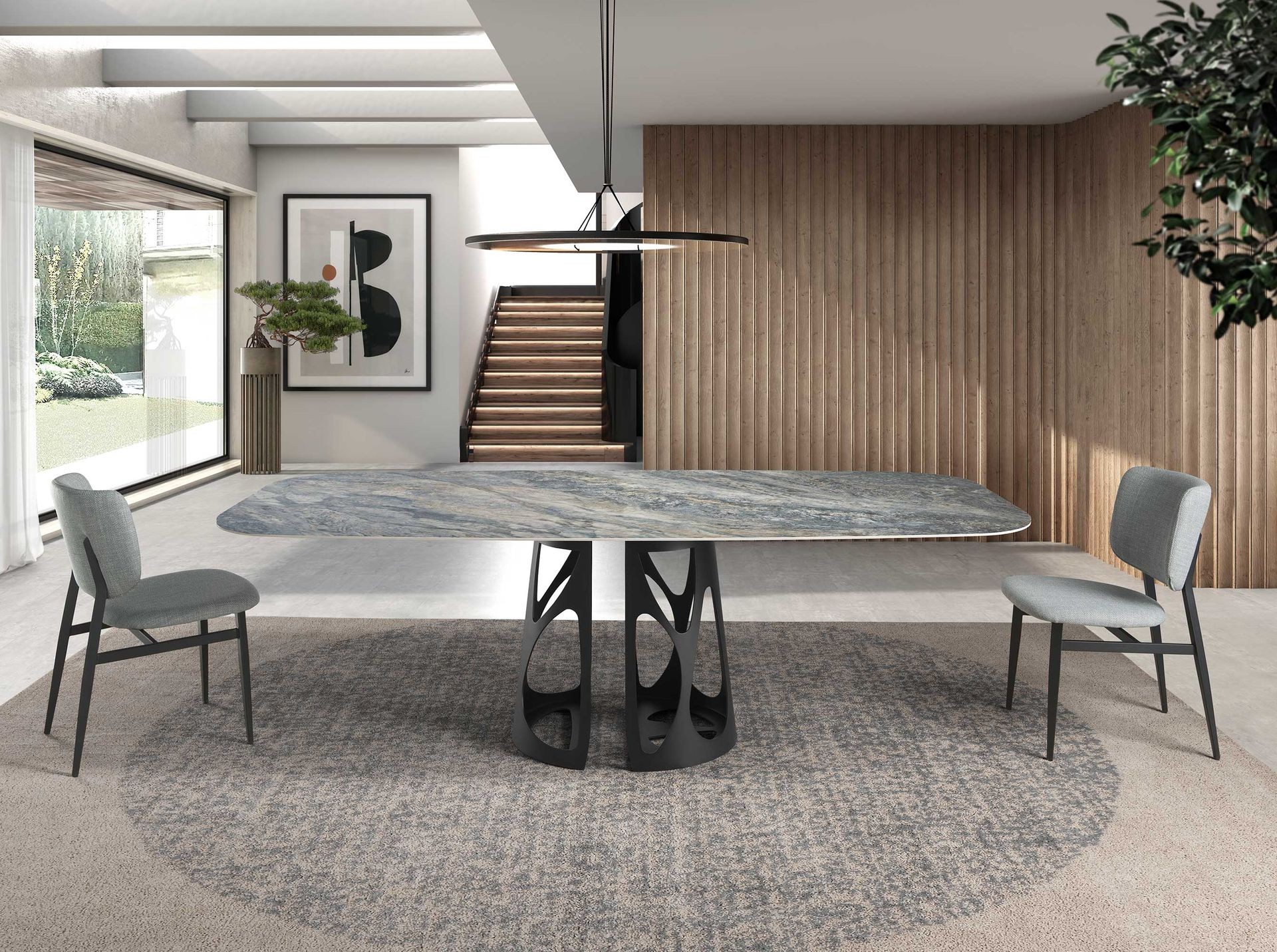Angel Cerdá 1136 – Elegante ovale eettafel in blauw porselein marmer en zwart epoxystaal
