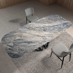 Angel Cerdá 1136 – Elegante ovale eettafel in blauw porselein marmer en zwart epoxystaal